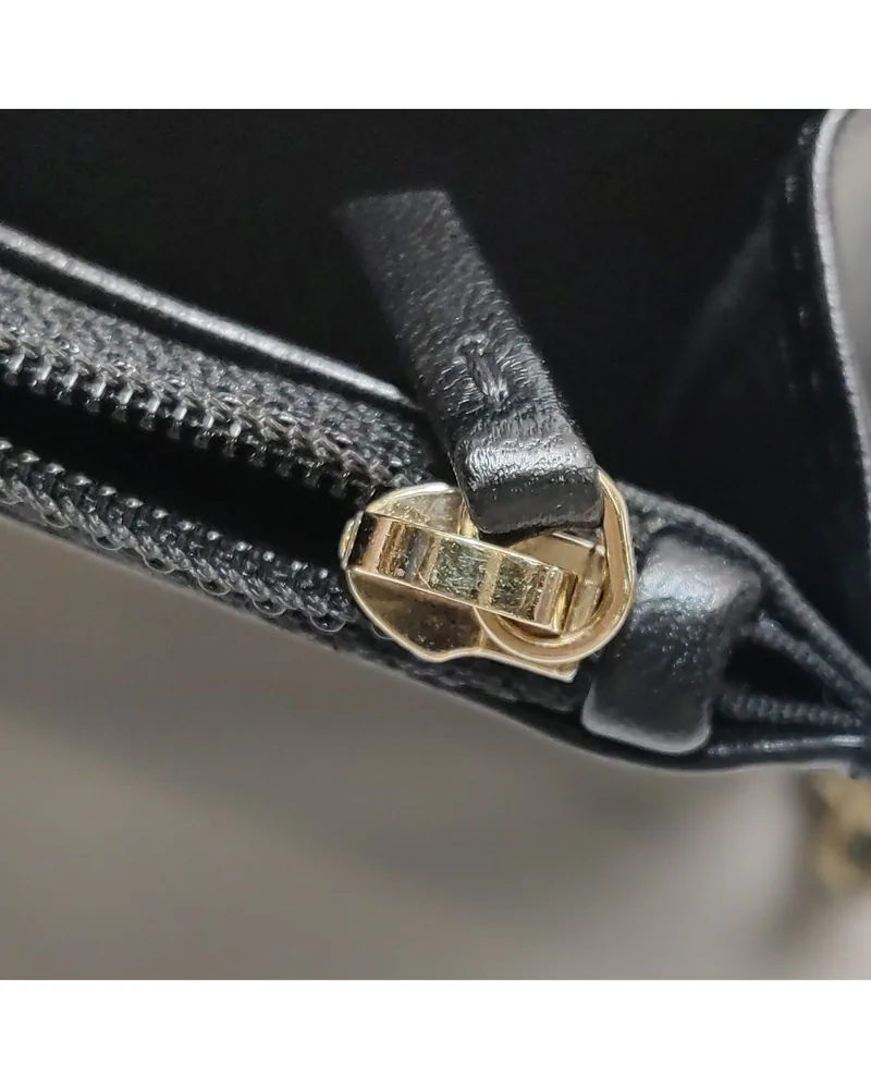 Chanel Trendy CC Wallet on Chain, close up light wear on the hardware