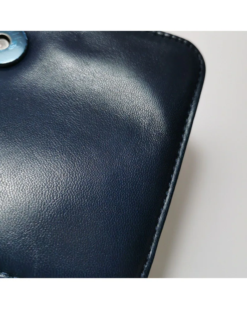 Chanel Boy Brick Box Bag, close up light scratches on the body and the front