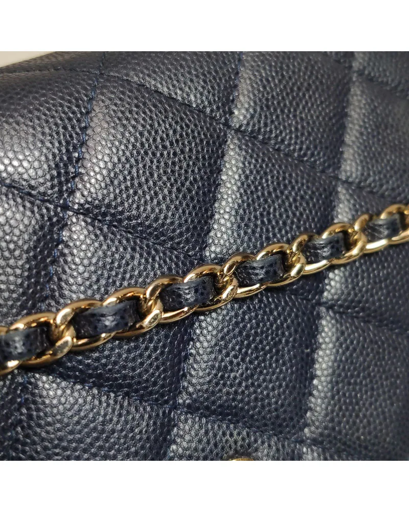 Chanel Classic Wallet on Chain, close up light wear on the strap