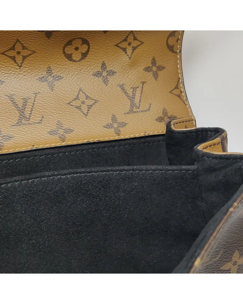 Louis Vuitton Pochette Métis MM, close up light wear on the lining