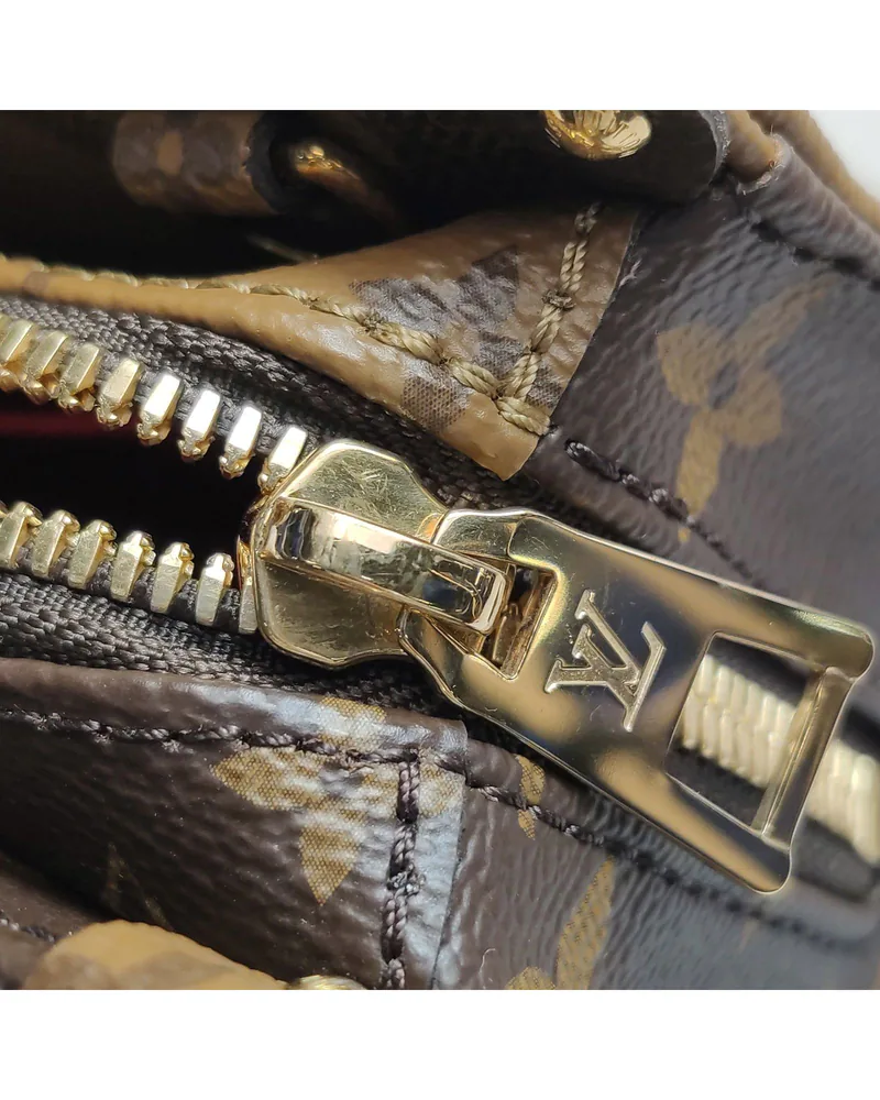 Louis Vuitton OnTheGo East West, close up light wear on the hardware