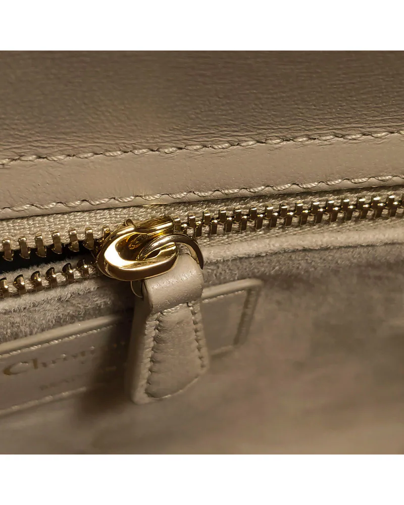 Dior Lady Dior Small, close up light wear on the hardware