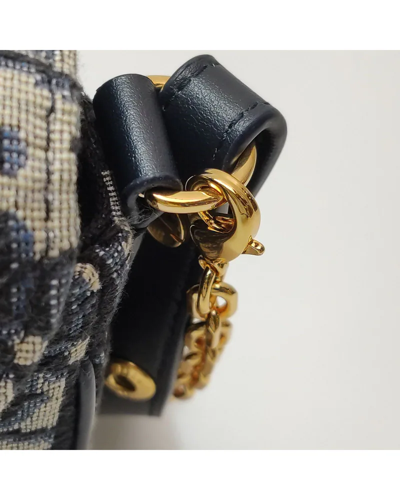 Dior 30 Montaigne, close up light wear on the hardware