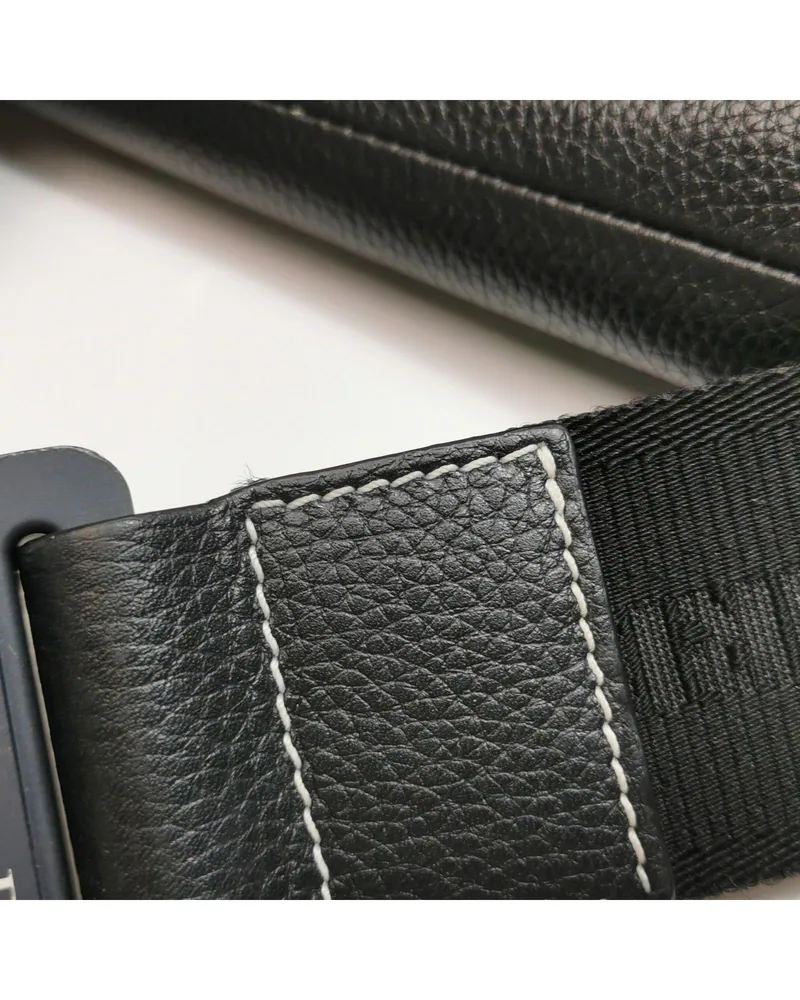 Dior Saddle Bag, sacai Edition, close up light wear on the strap