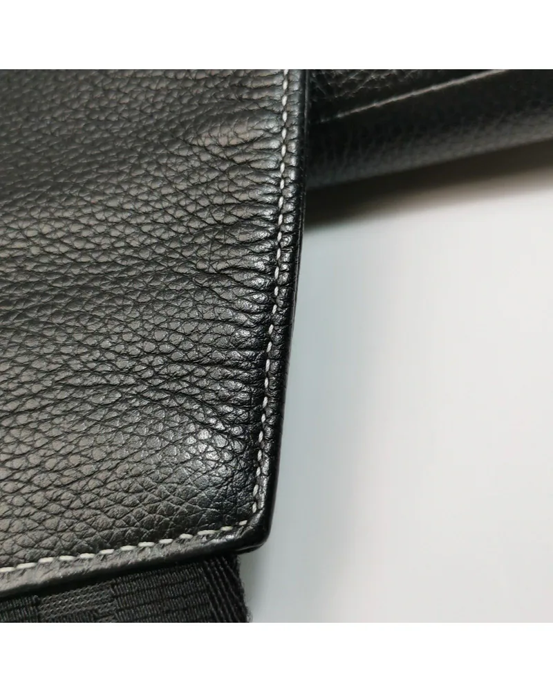 Dior Saddle Bag, sacai Edition, close up light wear on the strap