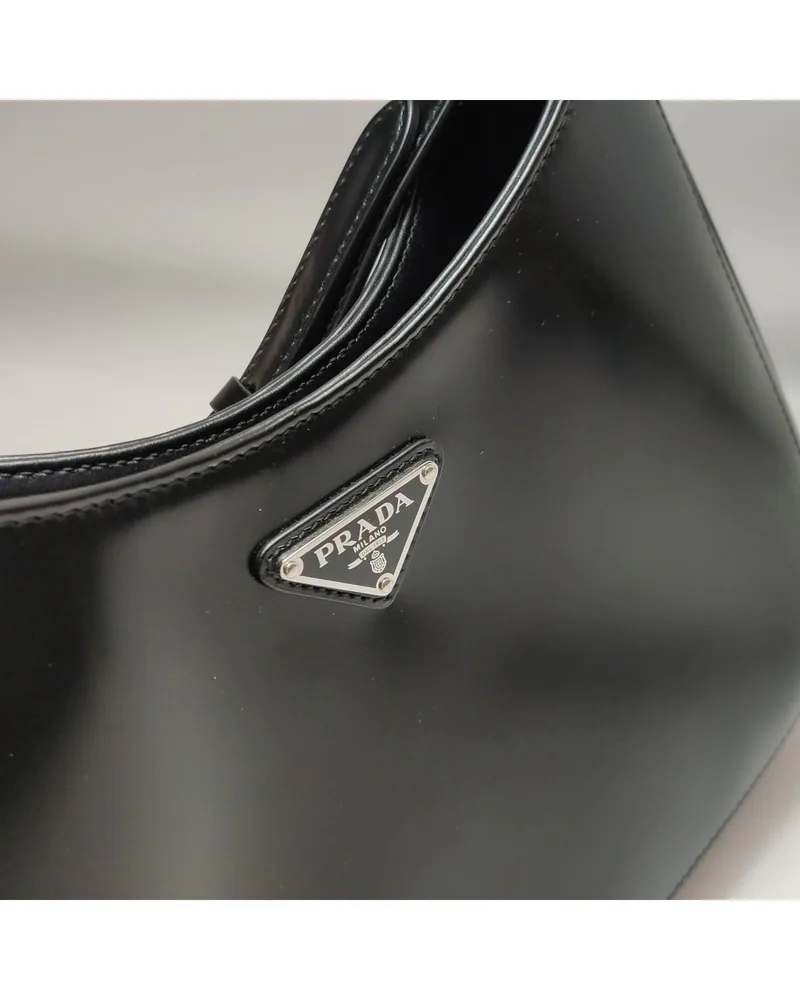 Prada Cleo Medium, close up light wear on the hardware