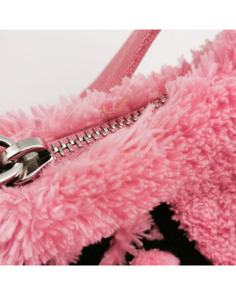 Prada Re-Edition 2000, Shearling, close up light wear on the hardware