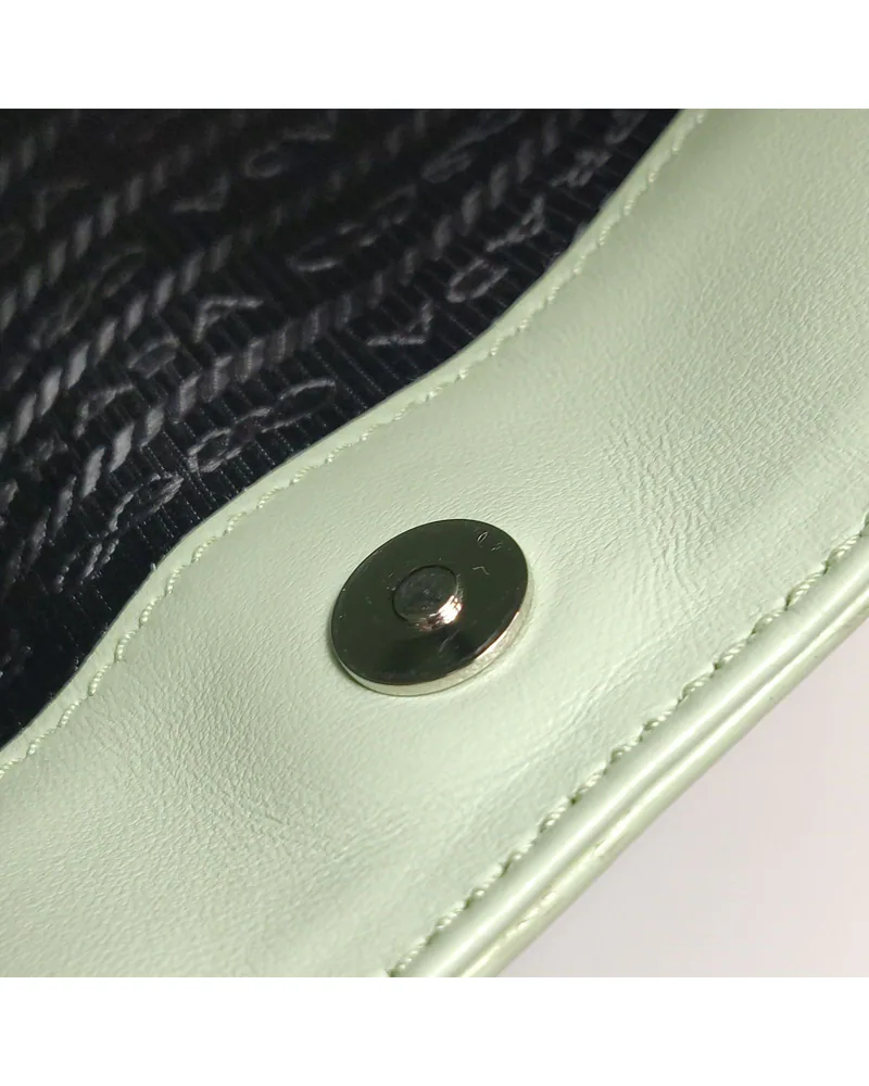 Prada Cleo Medium, close up light wear on the hardware
