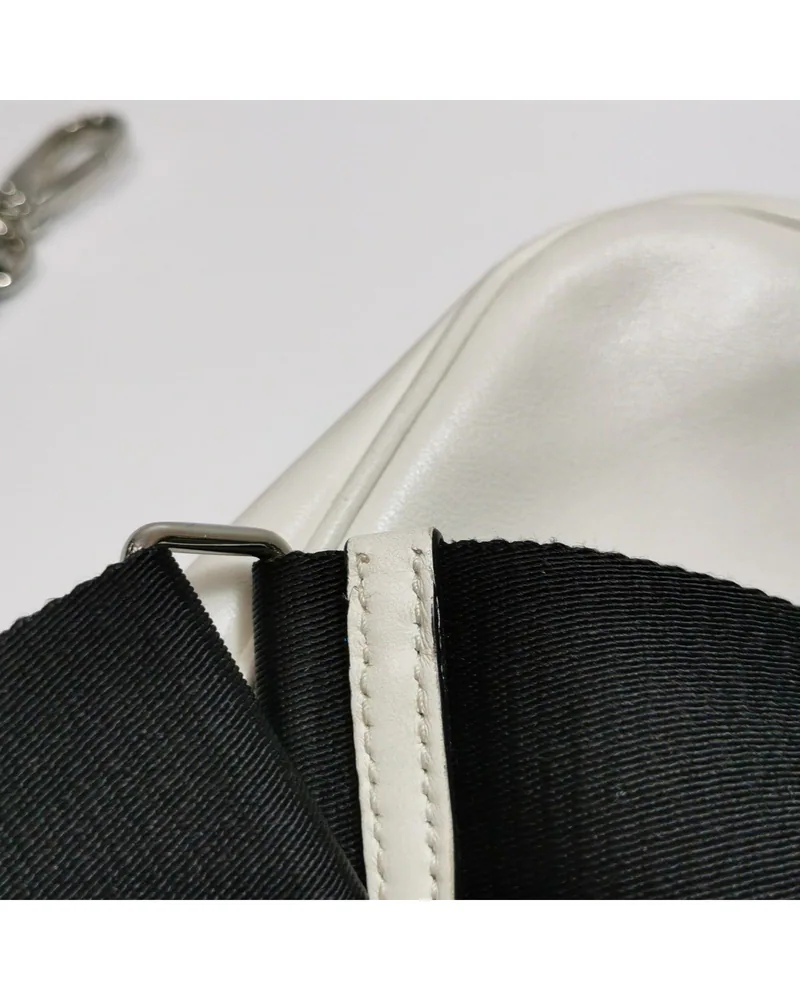 Prada Triangle Bag with Pouch, close up light wear on the strap