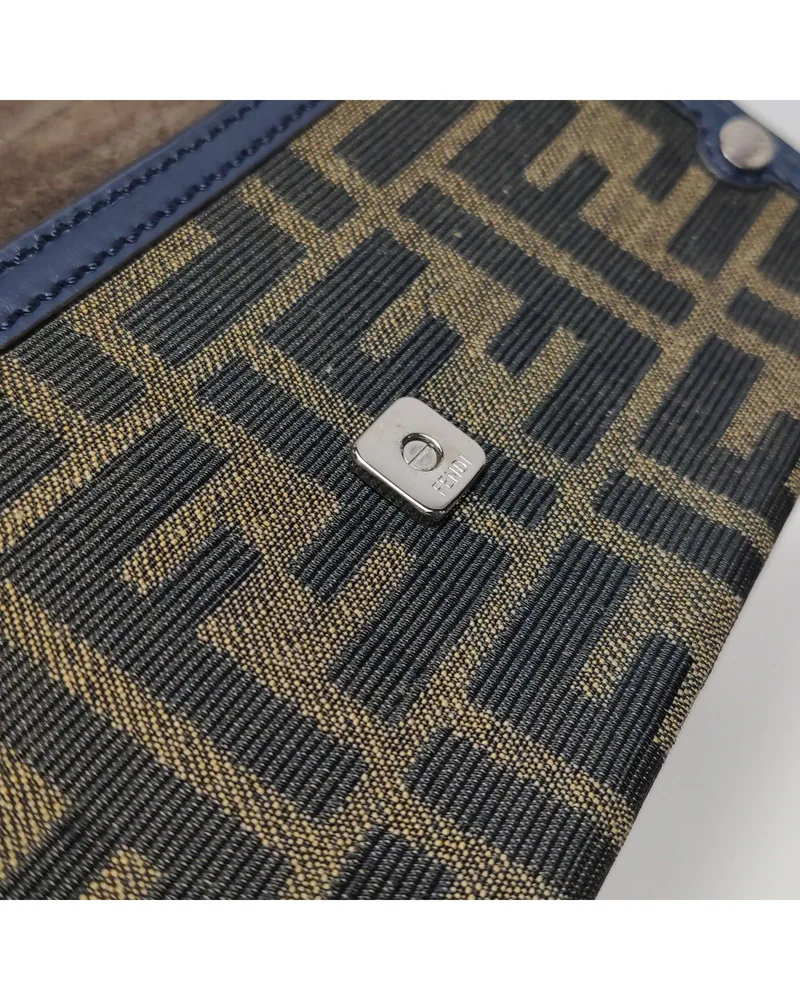 Fendi Baguette Soft Trunk Mini, close up light wear on the hardware
