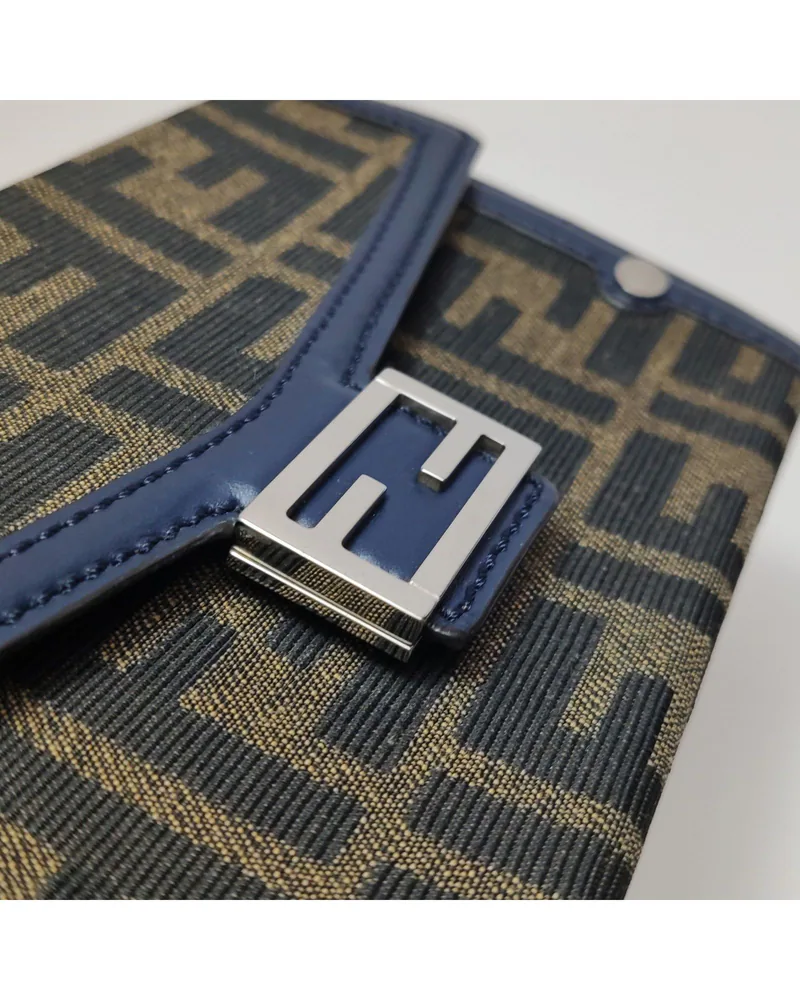 Fendi Baguette Soft Trunk Mini, close up light wear on the hardware