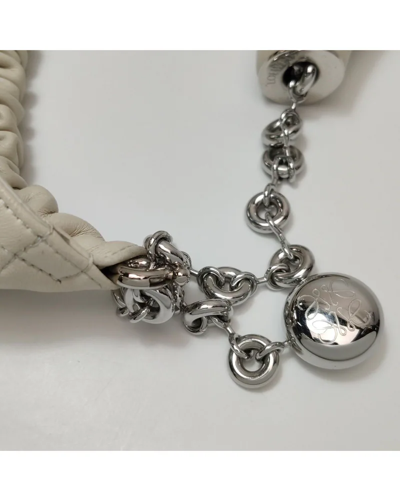 Loewe Squeeze Small, close up light wear on the strap and the clasp