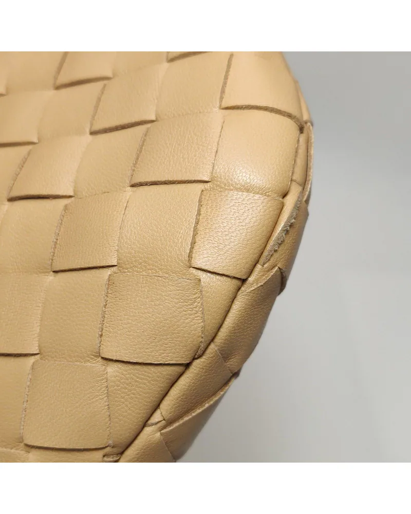 Bottega Veneta Mini Jodie, close up light wear on the body