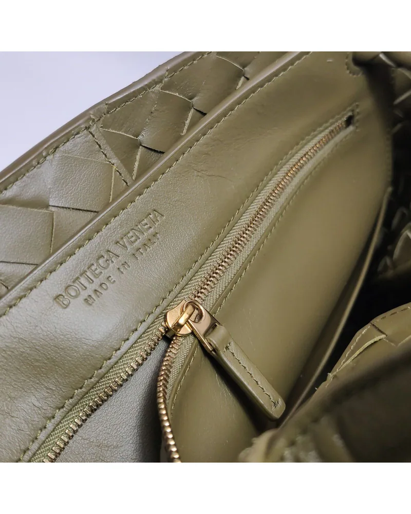 Bottega Veneta Andiamo Medium, close up light wear on the hardware
