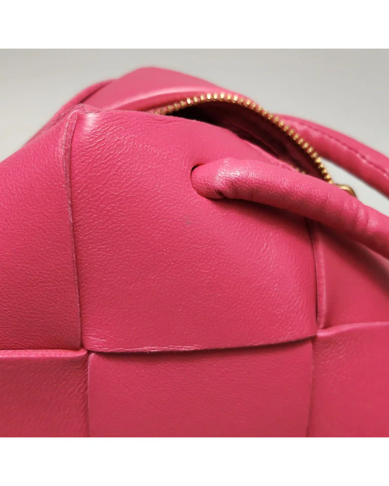Bottega Veneta Mini Cassette, close up light marks on the body and the front