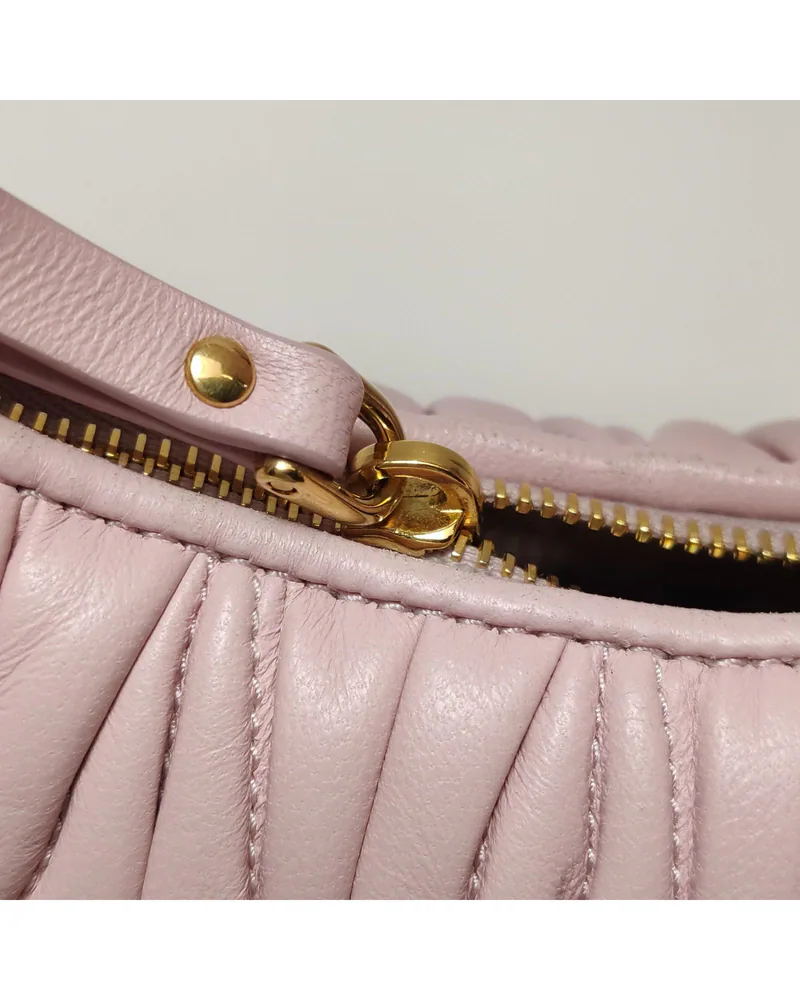 Miu Miu Wander Mini Crossbody, close up light wear on the hardware