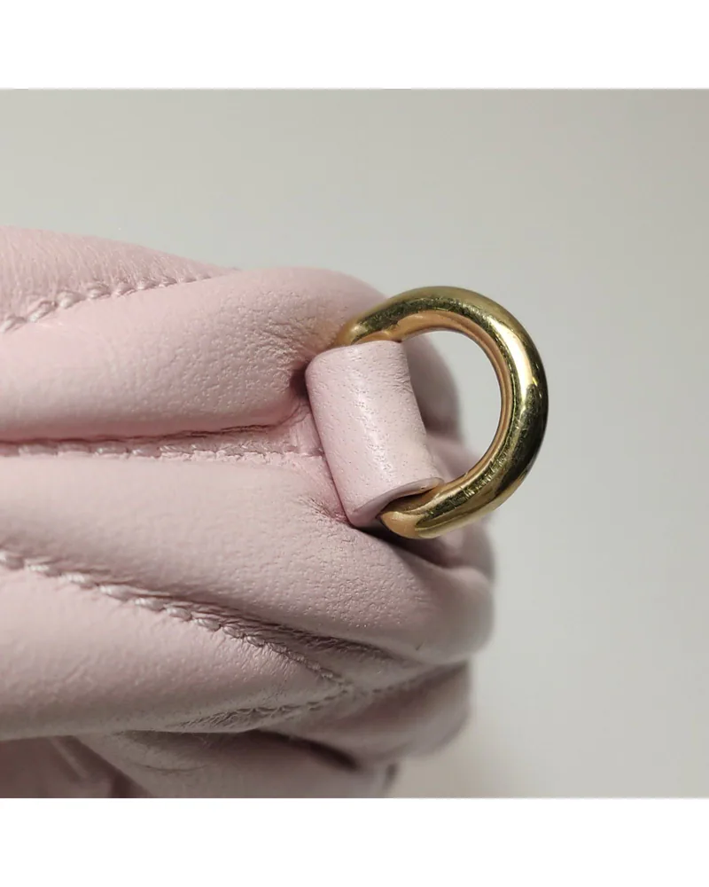 Miu Miu Wander Mini Crossbody, close up light wear on the hardware
