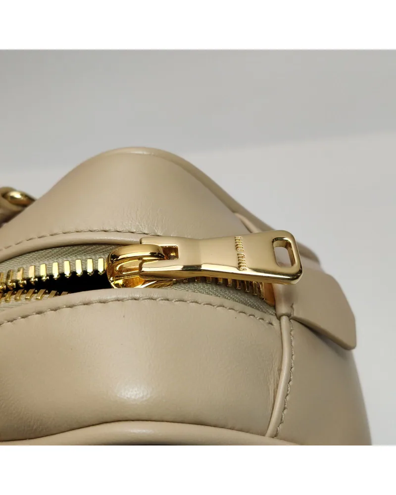Miu Miu Arcadie, close up light wear on the hardware