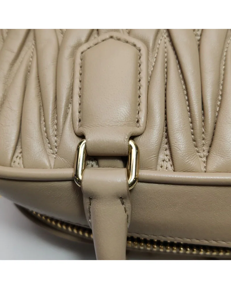 Miu Miu Arcadie, close up light wear on the handle