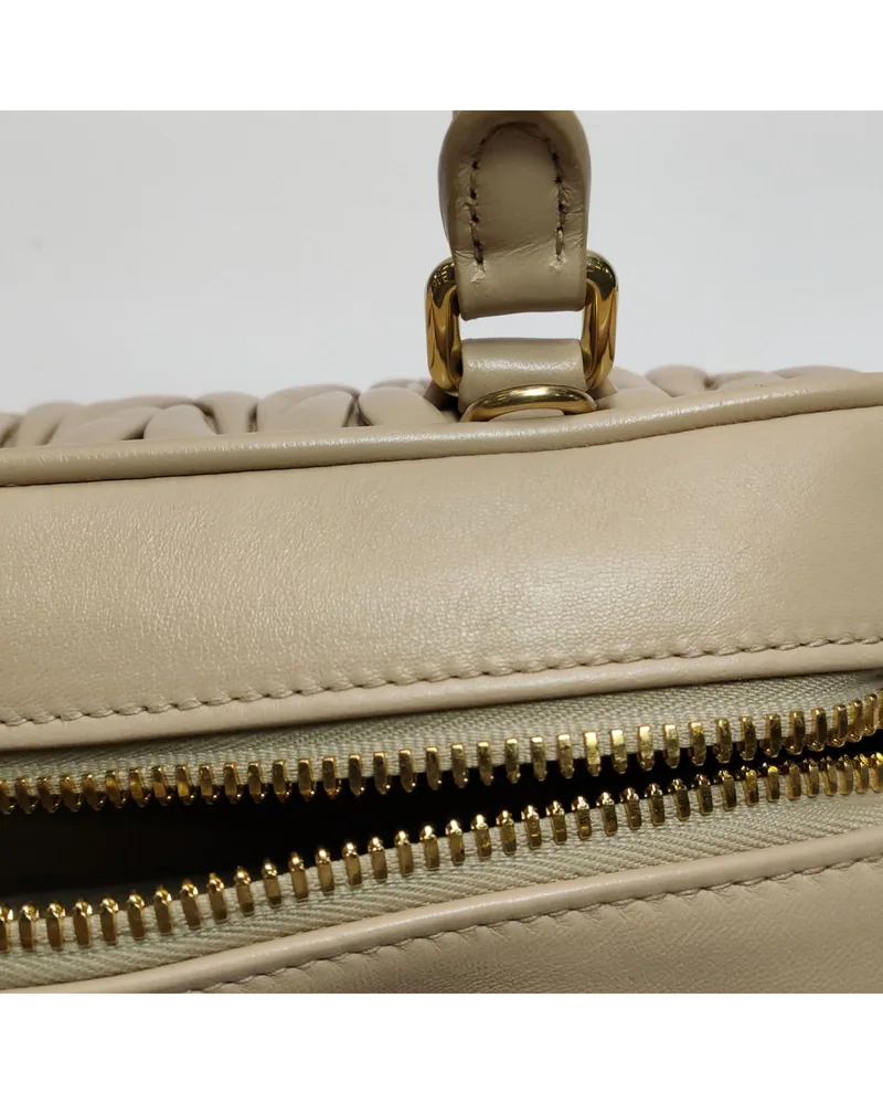Miu Miu Arcadie, close up light wear on the opening