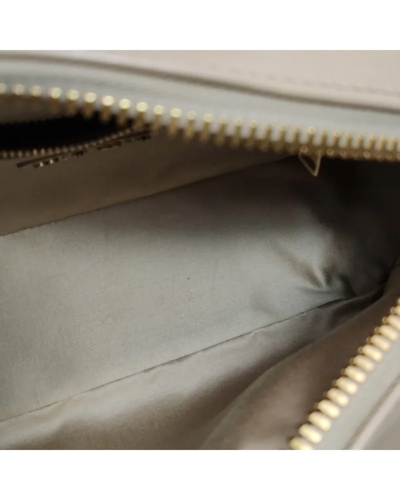 Miu Miu Arcadie, close up light marks on the lining