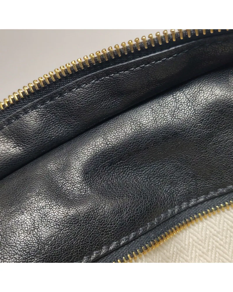 Miu Miu Aventure, close up light marks on the lining