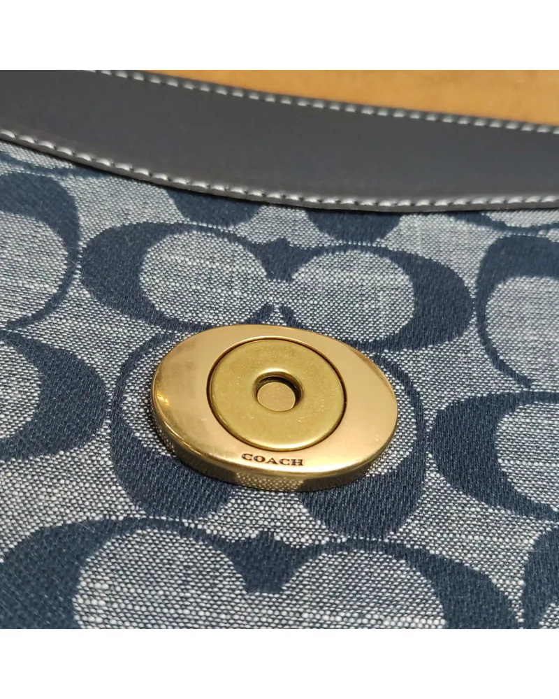 Coach Tabby 26, close up light wear on the hardware