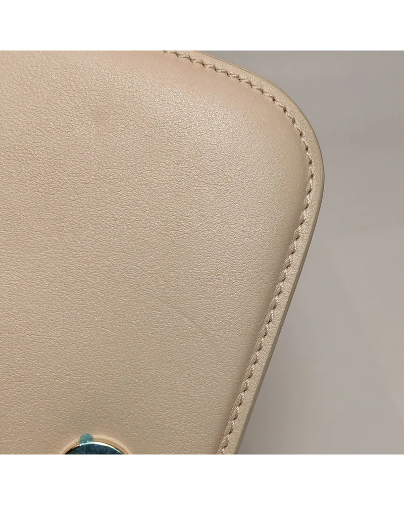 Valentino Locò Small, close up light pressure marks on the body and the front