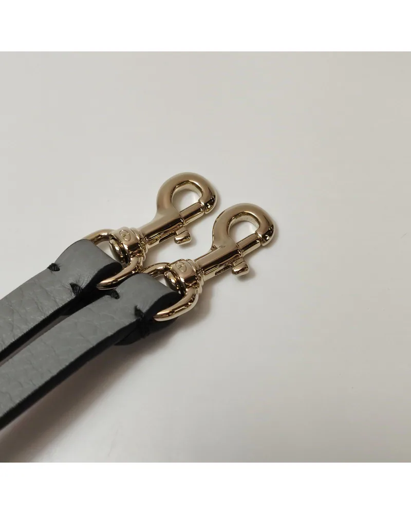 Valentino Rockstud Reversible, close up light wear on the hardware