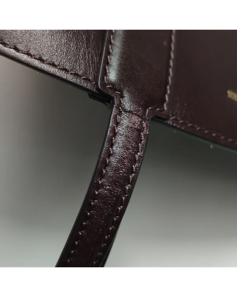 Alexander McQueen Basket Bag, close up moderate wear on the strap