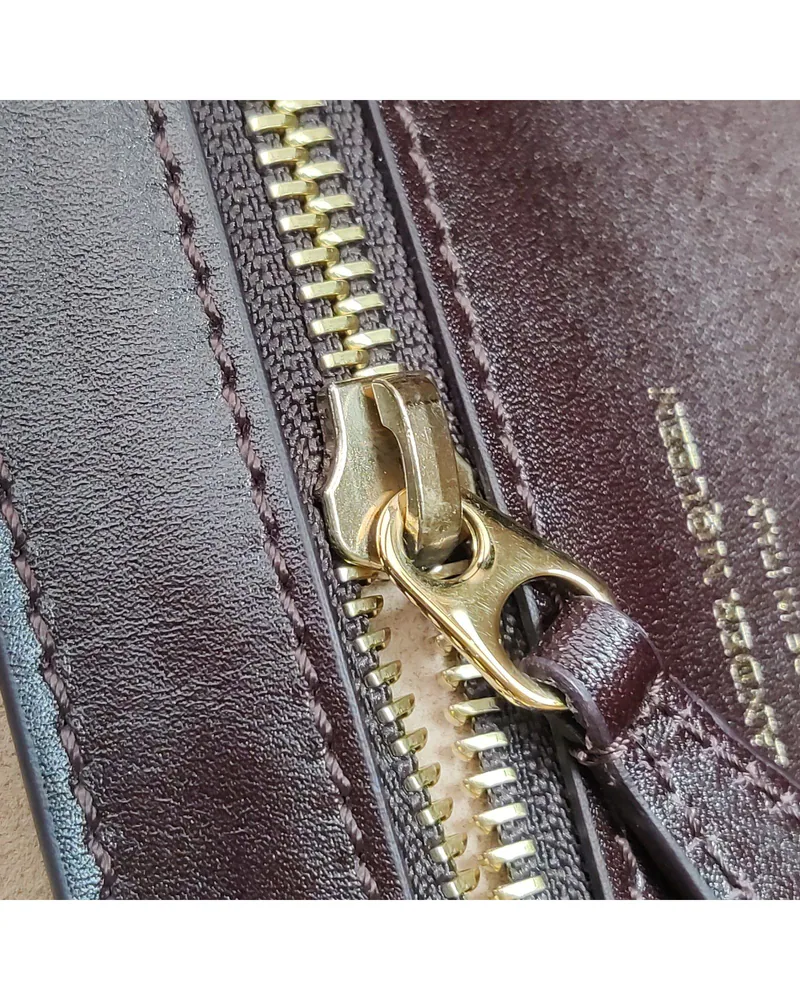 Alexander McQueen Basket Bag, close up light wear on the zip