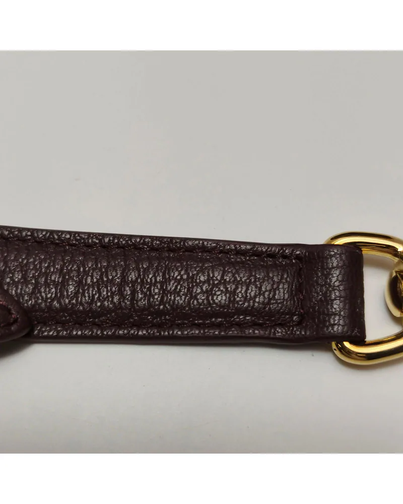 Alexander McQueen The Box Bag, close up light marks on the strap