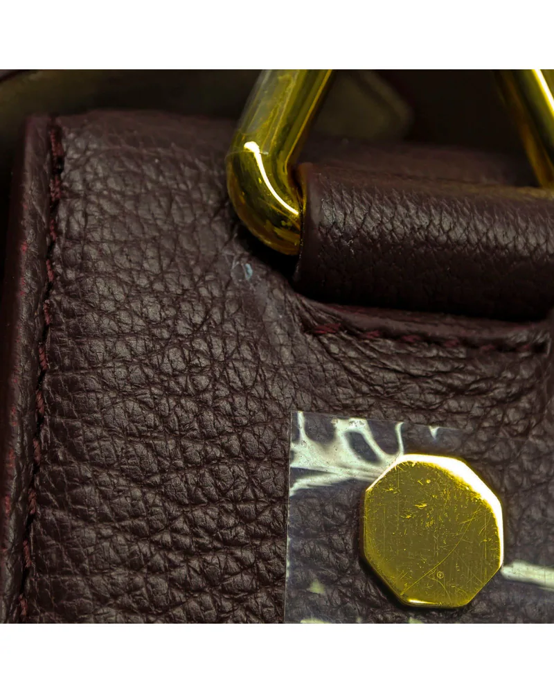 Alexander McQueen The Box Bag, close up light marks on the sides