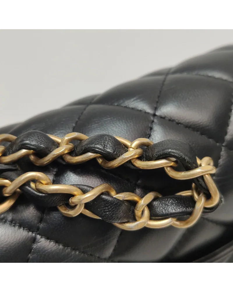 Chanel Classic Flap Large Mini, close up light wear on the strap