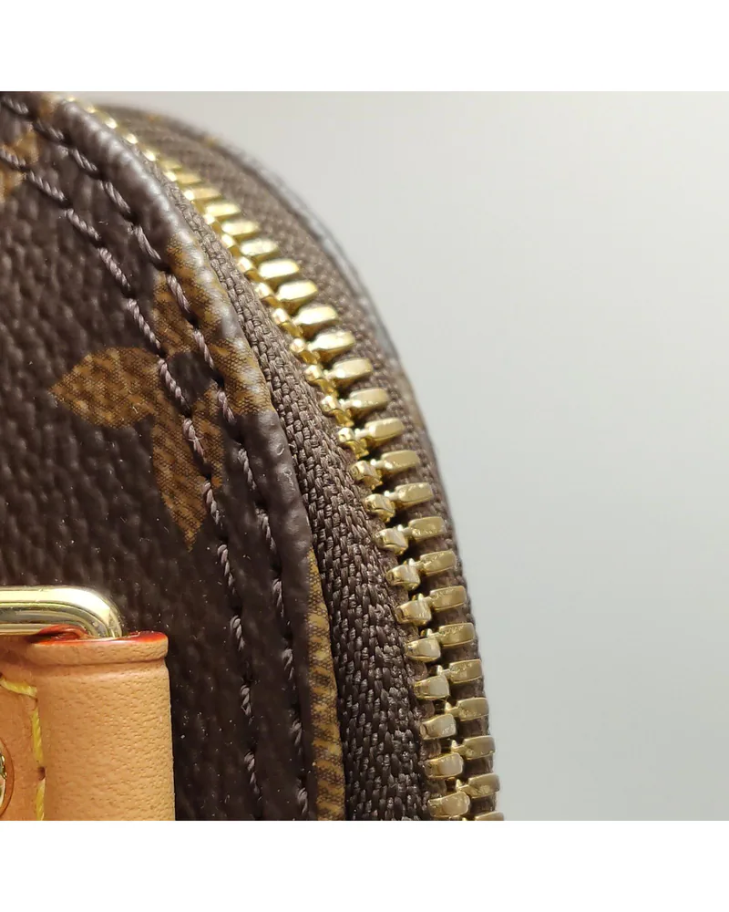 Louis Vuitton Nano Alma, close up light wear on the opening