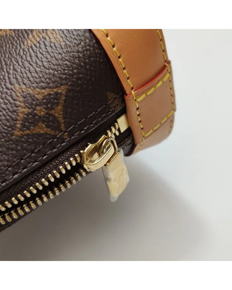 Louis Vuitton Nano Alma, close up light wear on the hardware