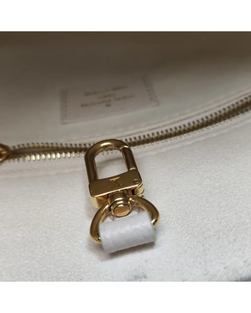 Louis Vuitton OnTheGo PM, Giant Monogram, close up light wear on the hardware