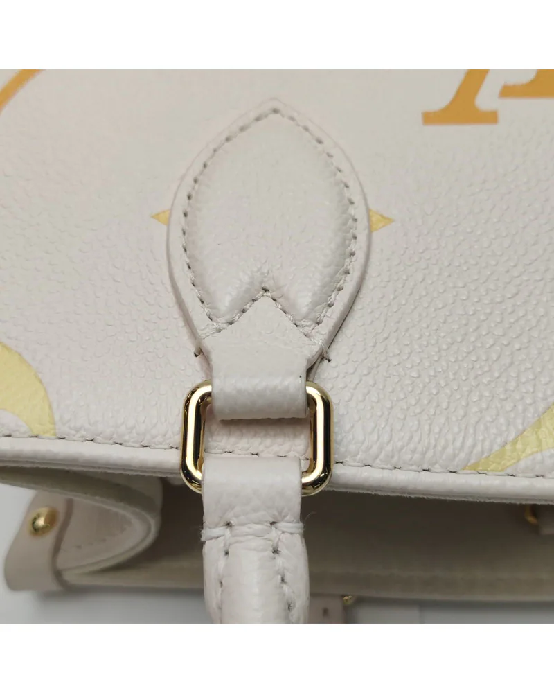 Louis Vuitton OnTheGo PM, Giant Monogram, close up light wear on the hardware