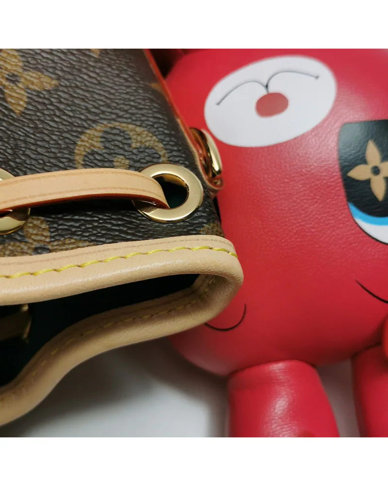 Louis Vuitton Nano Noé, Sun Yitian Collaboration, close up light marks on the natural leather trim