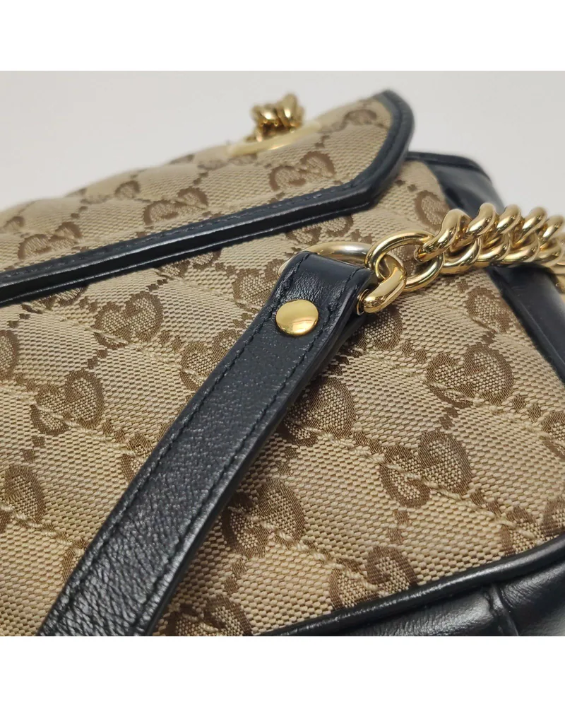 Gucci GG Marmont Mini, close up light wear on the strap