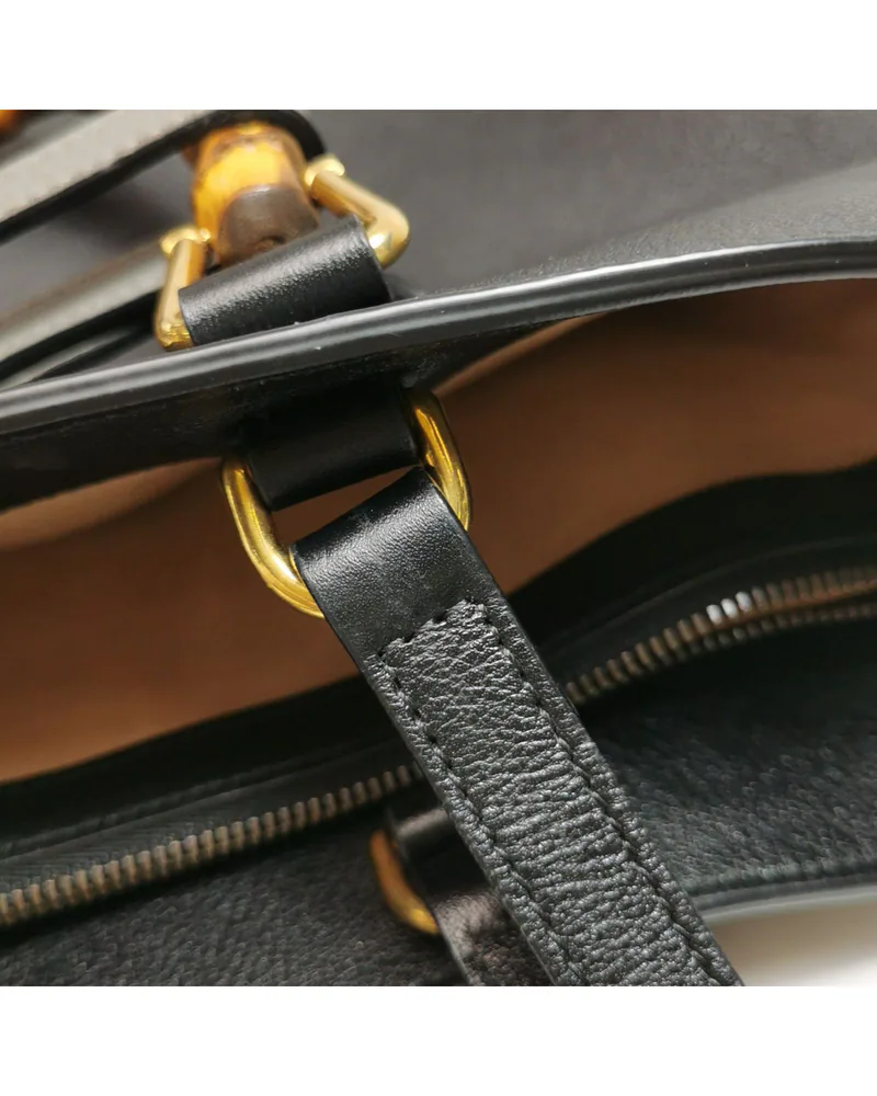 Gucci Diana Medium, close up light wear on the strap