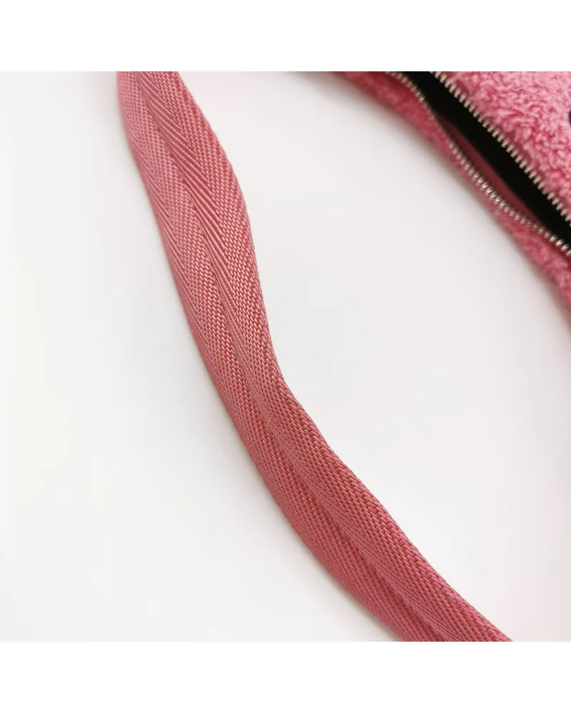 Prada Re-Edition 2000, Shearling, close up light marks on the handle