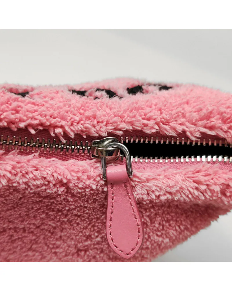 Prada Re-Edition 2000, Shearling, close up light wear on the zip