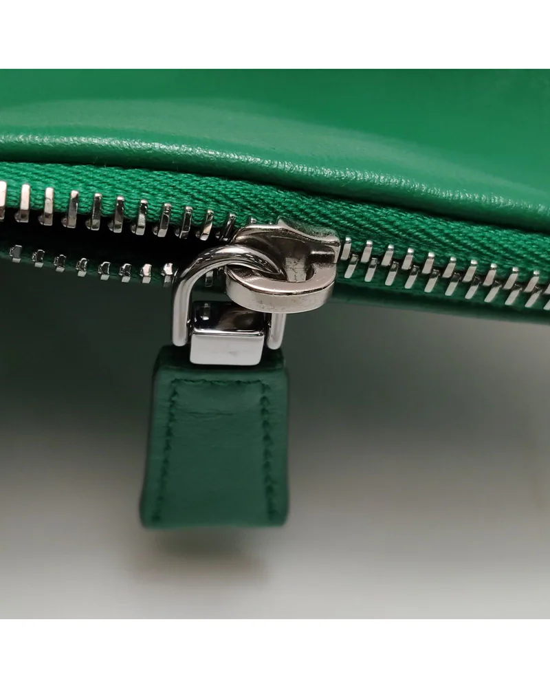Prada Triangle Mini, close up light wear on the hardware
