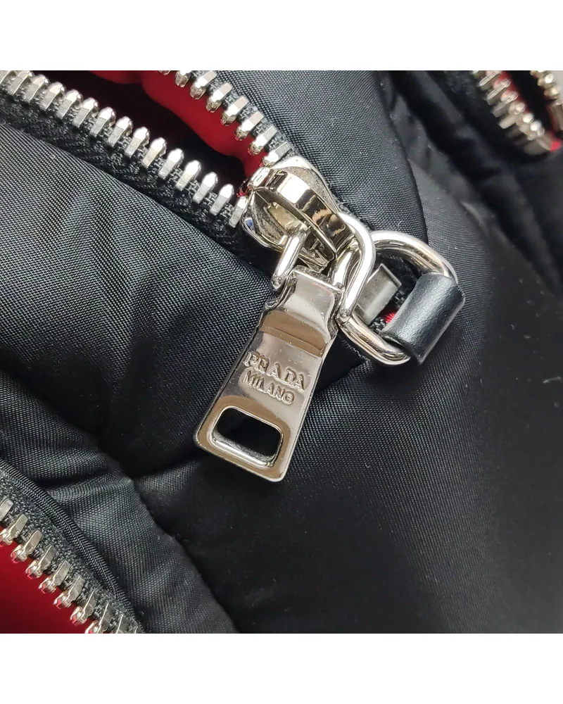 Prada Re-Nylon Cargo Crossbody, close up light wear on the hardware