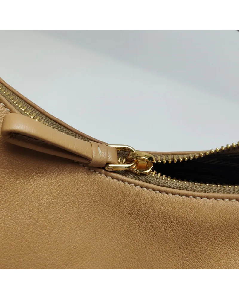 Prada Arqué, close up light wear on the hardware