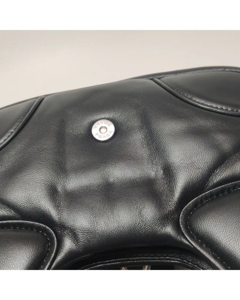 Prada Moon, close up light pressure marks on the body and the front