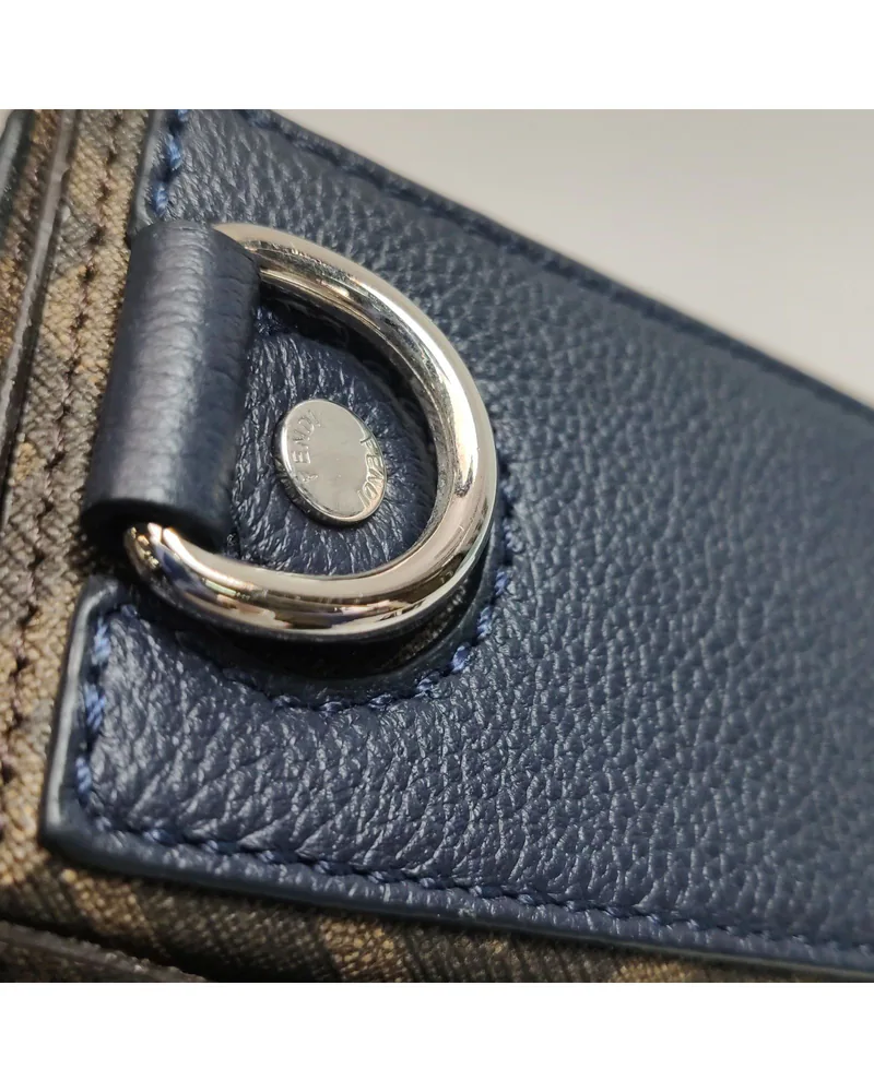 Fendi Baguette Soft Trunk, close up light wear on the hardware