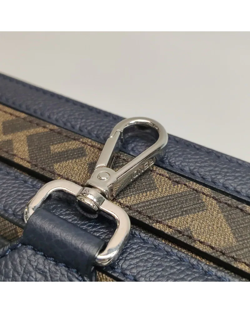 Fendi Baguette Soft Trunk, close up light wear on the hardware