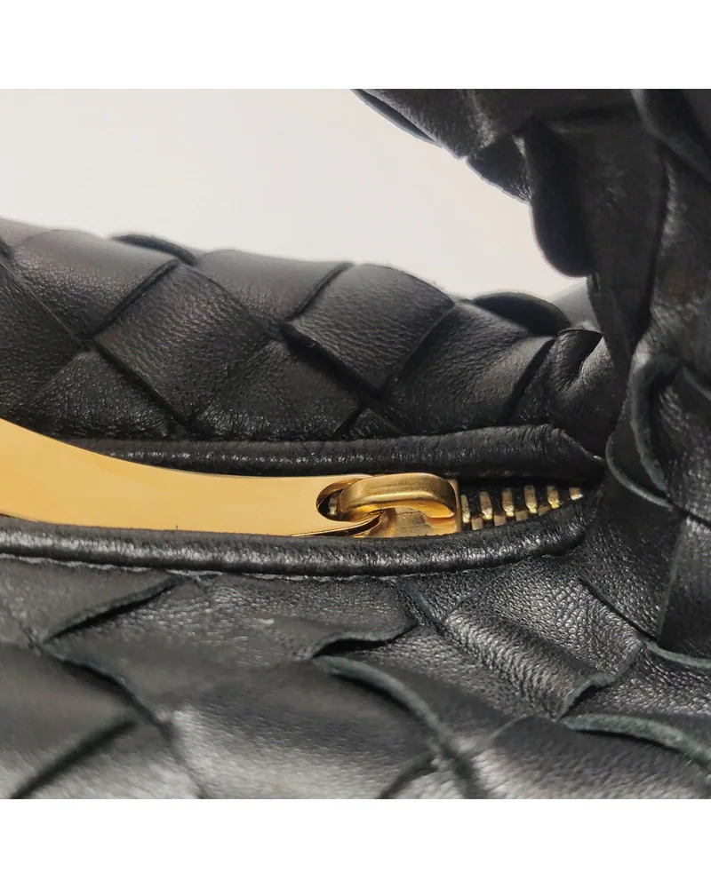 Bottega Veneta Mini Jodie, close up light wear on the zip